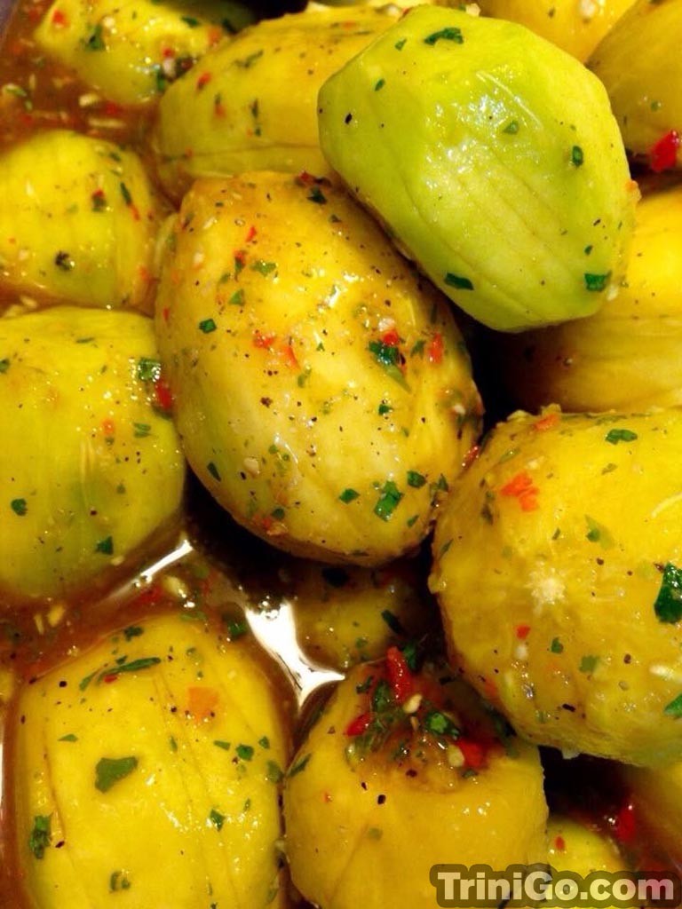 | Half-ripened fruit (mango, pommecythre, pommerac, plum, pineapple, etc) mixed with herbs, seasoning, and spicy pepper sauce. | TriniGo