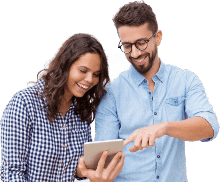 Two smiling friends looking at a tablet together